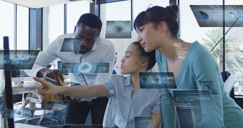 Collaborative professionals analyzing holographic data in modern office