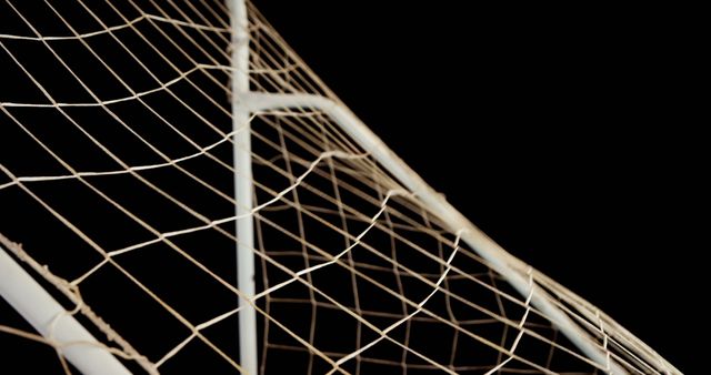 Close-up of Soccer Goal Net Against Black Background - Download Free Stock Photos Pikwizard.com
