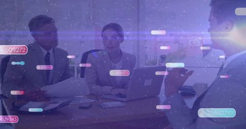 Team Analyzing Data with Digital Overlays in Professional Meeting