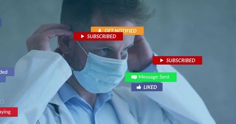 Male doctor adjusting surgical mask before patient examination in clinical practice