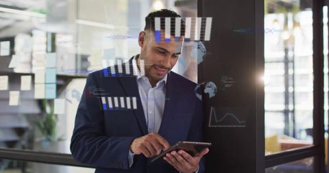 Business Professional Analyzing Data on Digital Interface