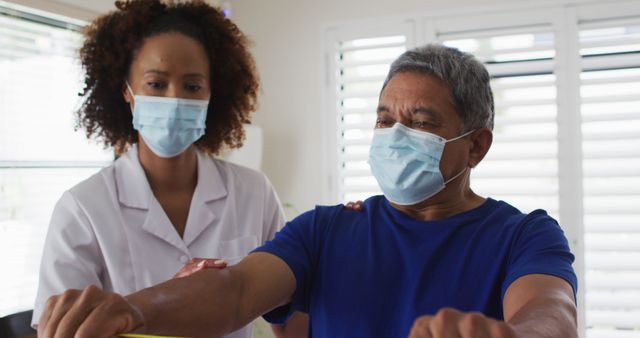 Elderly Patient Receiving Physical Therapy from Healthcare Worker - Download Free Stock Images Pikwizard.com