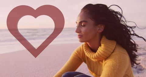 Serene morning meditation by beach & heart symbol emotion