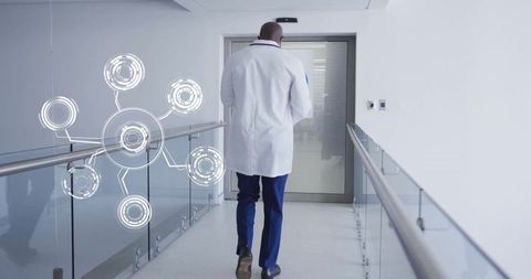 Doctor Advancing in Modern Hospital Technology Environment