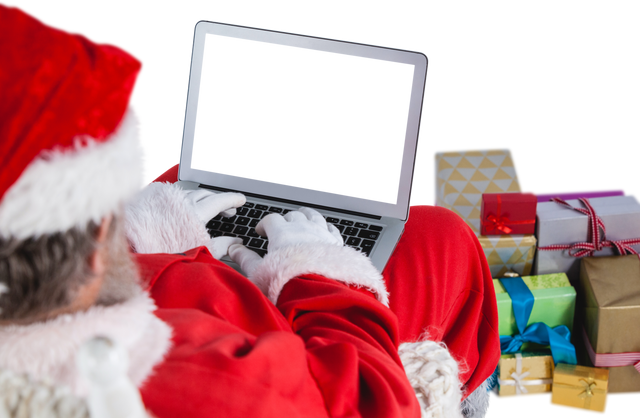 Transparent image of Santa Claus using laptop beside Christmas gift boxes - Download Free Stock Videos Pikwizard.com