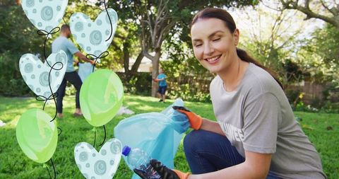 Eco volunteer collecting litter during environmental cleanup