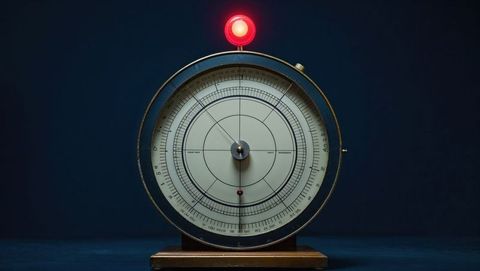 antique geometric measuring instrument with glowing red light, seismograph concept - Download Free Stock Images Pikwizard.com