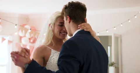 Joyful Couple Sharing Romantic Wedding Dance