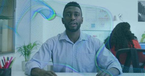 Businessman in modern office with digital overlay