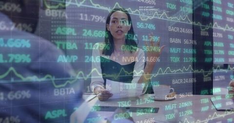 Financial analyst discussing economic trends in corporate meeting