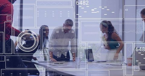 Reviewing papers and collaborating with HUD data overlays in modern office meeting