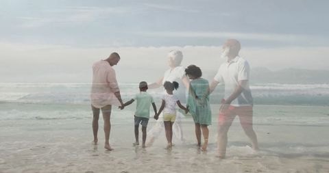 Multigenerational Family Walking on Waves at Scenic Beach