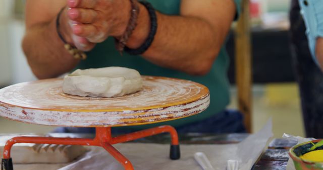 Hands Crafting Pottery on a Spinning Wheel - Download Free Stock Images Pikwizard.com