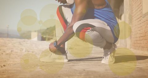 Fitness Enthusiast Tying Shoe Laces in Motivational Setting - Download Free Stock Images Pikwizard.com