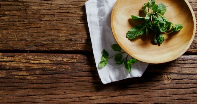 Fresh Mint Leaves in Wooden Bowl on Rustic Table - Download Free Stock Images Pikwizard.com