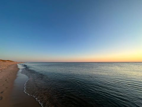 Serene beach horizon at sunset