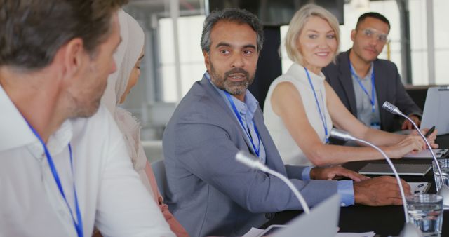 Diverse Business Professionals Discussing at Conference Table - Download Free Stock Images Pikwizard.com