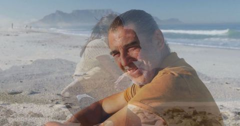 Smiling Mature Man Relaxing on Scenic Beach