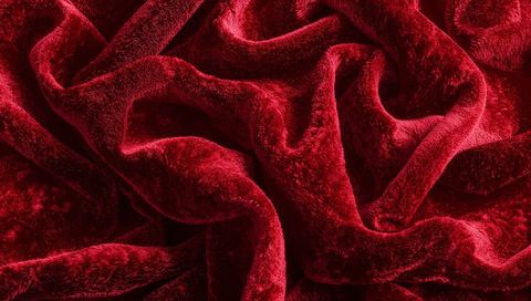 Plush Deep Red Velvet Fabric Shimmering Soft Pile with Luxurious Burgundy Folds