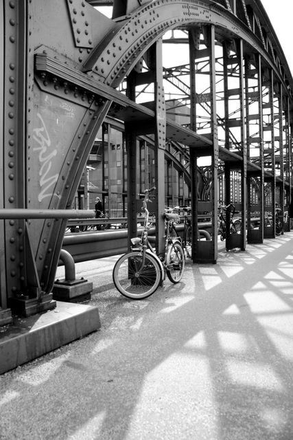 Bicycles Parked Under Steel Bridge in Urban Setting - Download Free Stock Images Pikwizard.com