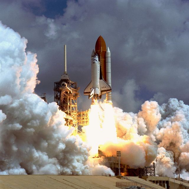 Space Shuttle Columbia is seen lifting off in dramatic fashion from NASA's Kennedy Space Center on June 20, 1996. Marking the beginning of mission STS-78, the launch features a powerful burst of white exhaust and vibrant fire at the rocket's base, as the shuttle ascends toward space. This historic event can be used in educational materials related to space exploration, documentaries, and visual content highlighting significant achievements in aerospace technology.