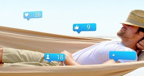 Person On Hammock With Social Media Notifications Outdoors