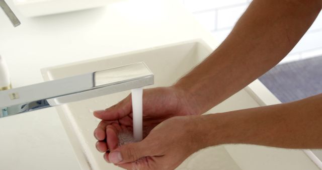 Close-Up of Hands Washing Under Faucet with Running Water - Download Free Stock Images Pikwizard.com