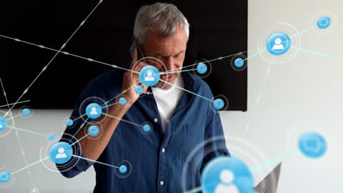 Senior Professional Discussing Business with Future Technology Display