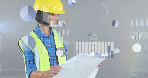 Engineer reviewing blueprint wearing hard hat and hi-vis vest with holographic data