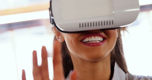 Woman Enjoying Virtual Reality with VR Headset - Download Free Stock Images Pikwizard.com
