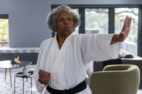 Senior African American Woman Karategi Training at Home