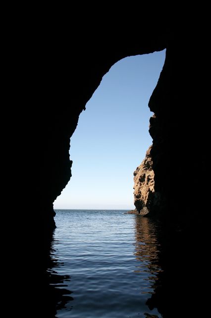 Nature Cave Opening with Sea and Cliff View - Download Free Stock Photos Pikwizard.com