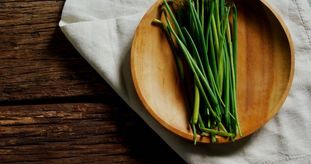 Fresh Green Chives on Wooden Plate on Rustic Table - Download Free Stock Images Pikwizard.com