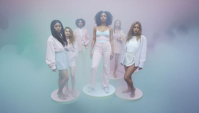 Models Sporting Pastel Fashion with Minimalist Elegance