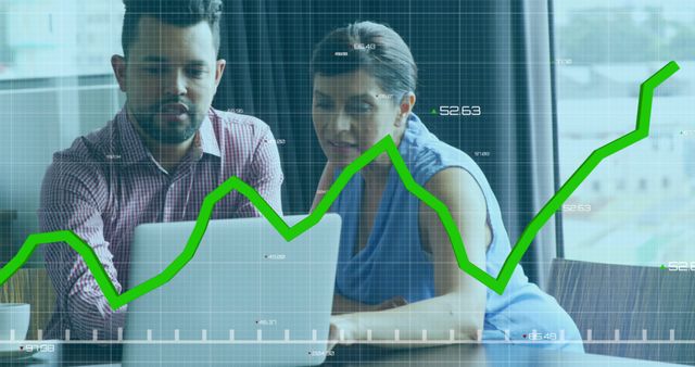 Business Professionals Analyzing Financial Data on Laptop with Graph Overlay - Download Free Stock Images Pikwizard.com