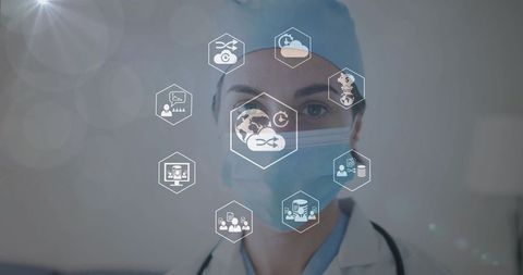 Female doctor wearing surgical mask with medical hud icons representing telemedicine data