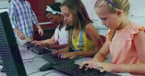 Diverse Schoolchildren Typing on Keyboards in Classroom - Download Free Stock Images Pikwizard.com