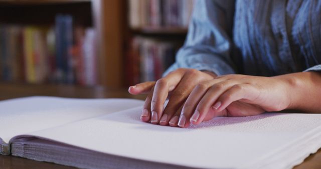 Person Reading Braille in Library - Download Free Stock Images Pikwizard.com