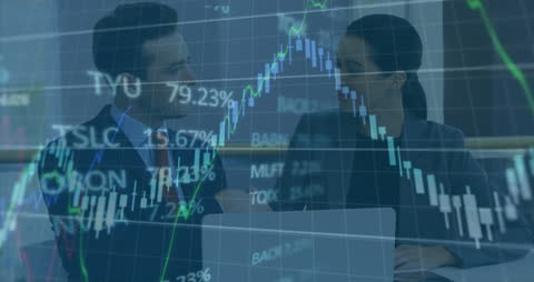 Business Colleagues Analyzing Financial Data on Screen