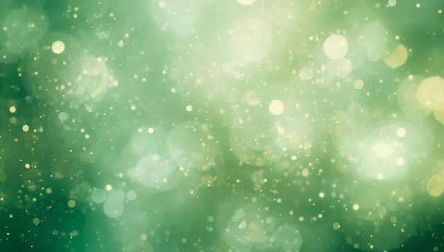 Glowing emerald bokeh field casting golden dust and soft mint-teal dreamy light halos