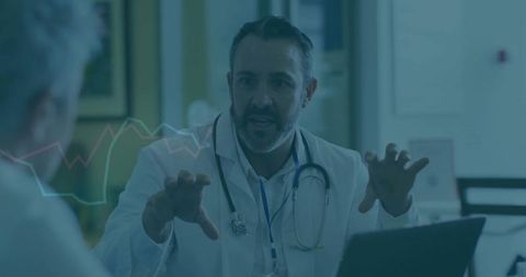 Doctor Consulting Patient with Gestures in Medical Office