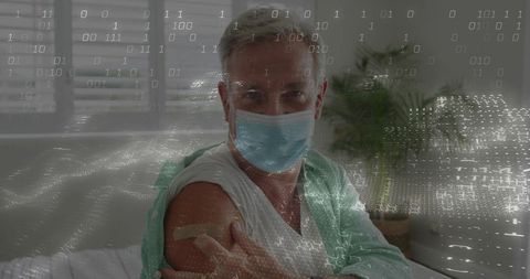 Senior Patient Promoting Healthcare Precautions in Hospital Room