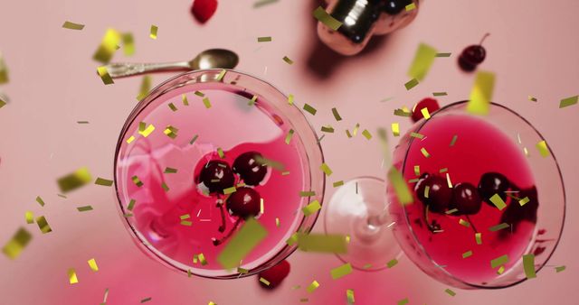 Festive Cocktail Celebration with Cherry Garnish - Download Free Stock Images Pikwizard.com