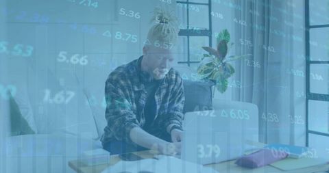 Albino African American Professional, Financial Data on Laptop - Download Free Stock Images Pikwizard.com