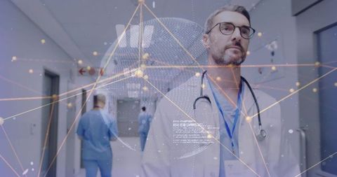 Mature male physician walking hospital corridor with holographic global network overlay