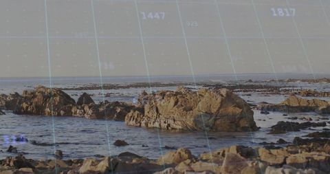 Coastal landscape with digital grid overlay reflecting navigation technology