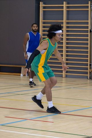 Athletic Gameplay in School Gymnasium