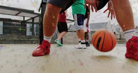 Energetic Game on Urban Rooftop Court Focused on Basketball