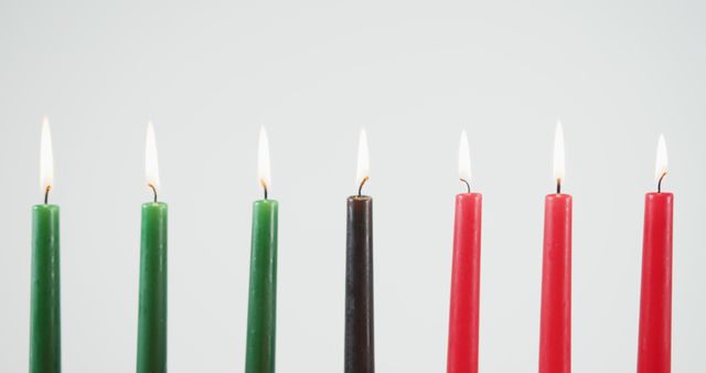 Seven Lit Candles in Black Red and Green Representing Kwanzaa - Download Free Stock Images Pikwizard.com