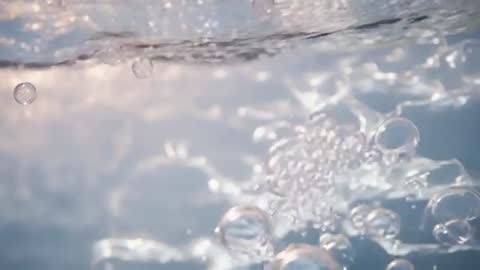 Underwater Bubbles and Light Reflections Creating Effervescent Abstract